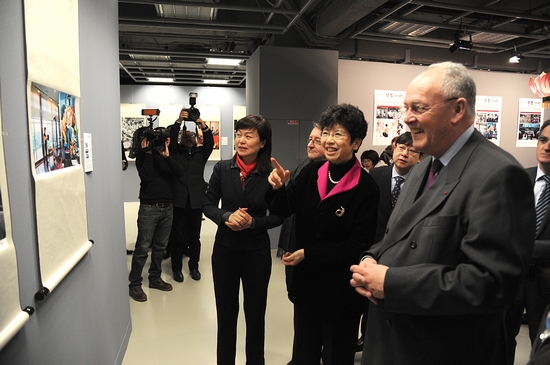 Guests visit the photography exhibition
